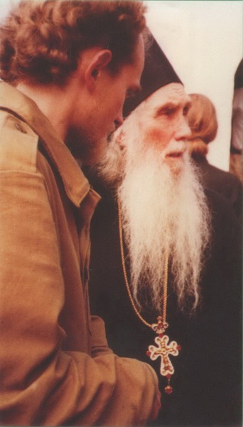 Archimandrite Kirill surrounded by people