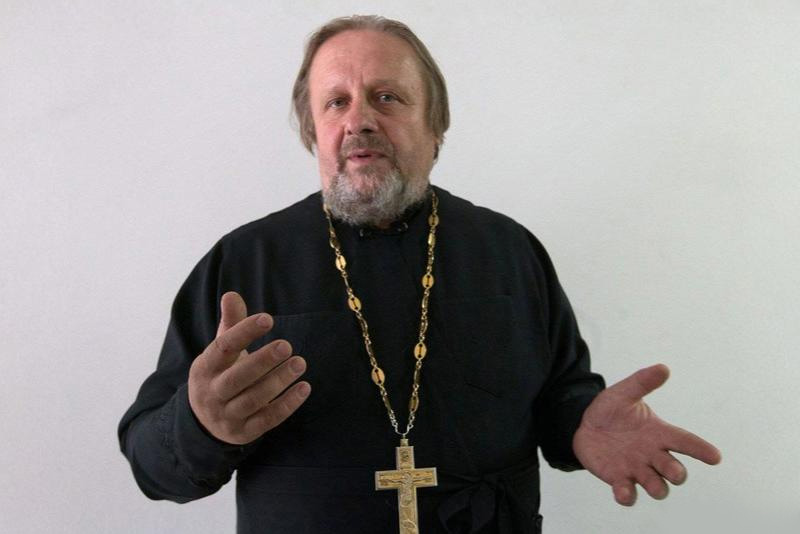 priest from the cancer clinic