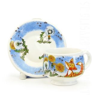 children's cup and a saucer with a fox