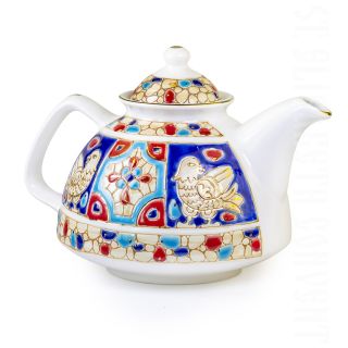 handmade teapot with eagles