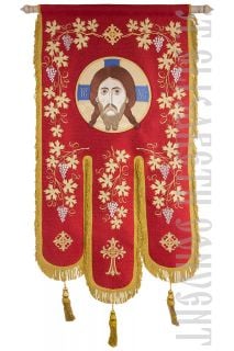 orthodox church banner decorated with embroidery and an icon of the Lord