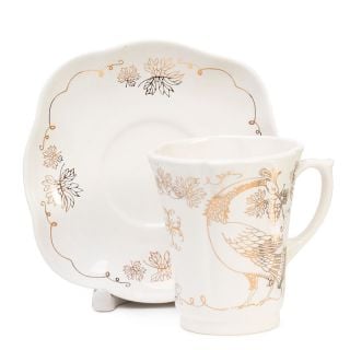 ceramic cup and saucer with irises