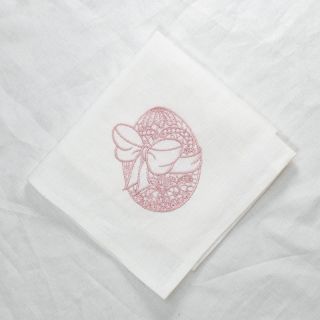 Easter napkin with an embroidered egg in a bow