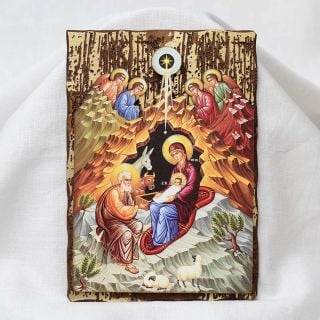 wooden graved icon of the Nativity of Christ