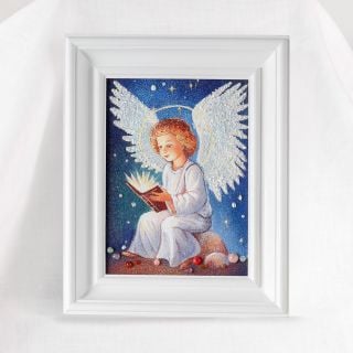 framed picture of an angel carrying a book with pearls and stones