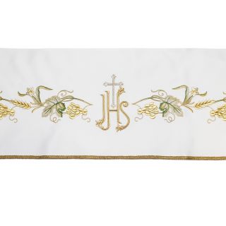 white altar frontal with embroidered grapes and cross and crops 