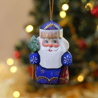 hanging hand carved santa with a bag of gifts 