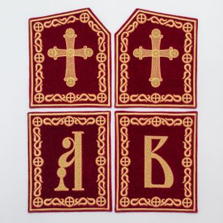 red and golden set of tablets for bishop