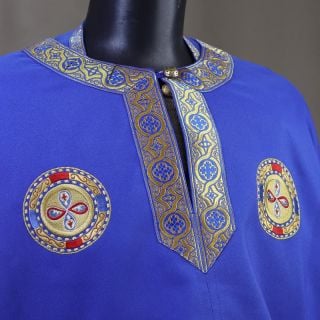 blue greek-style priest vestment with embroidered crosses and apostles