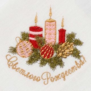 white linen table napkin with Christmas embroidery and merry Christmas inscription