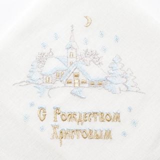 white embroidered napkin with Merry Christmas inscription