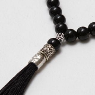agate prayer rope with a cross and a tassel