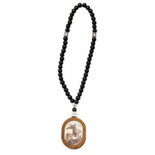 wooden car medallion with icons and prayer on the other side shungite