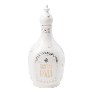 Holy water bottle with golden decal and a top
