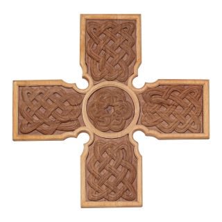 wooden handcarved cross from different types of wood in celtic style 