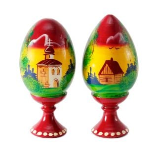 wooden hand-painted egg with a stand and church painting