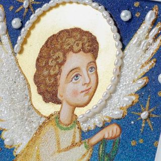angel over the city with pearls and stones handmade