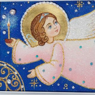 semi-precious picture of an angel with a candle and pearls