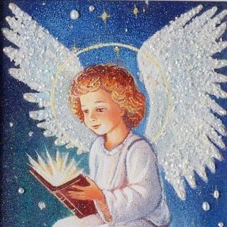framed picture of an angel carrying a book with pearls and stones