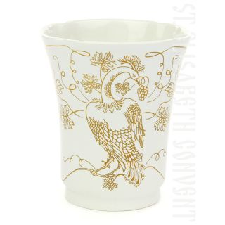 handmade ceramic cup with a decal and gold elements