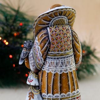 handcarved santa with owl