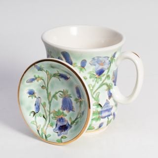 tea cup with a top british wild flower