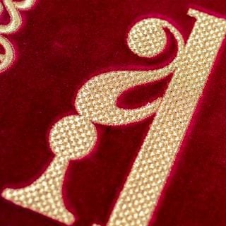 red and golden set of tablets for bishop