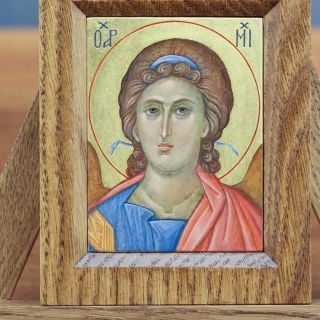 hand-painted icon of Archangel Michael with wooden frame
