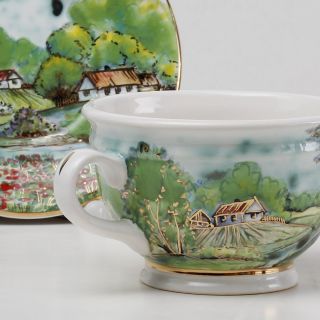 beautiful gift cup and saucer set with handmade paintinhs