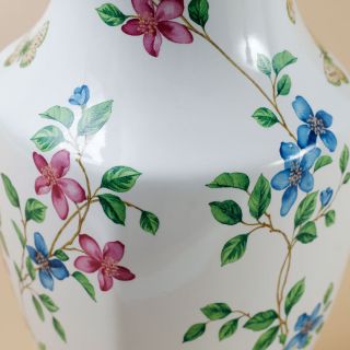 ceramic vase with flowers and butterflies inside and out