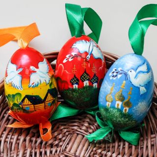 wooden easter egg with a ribbon