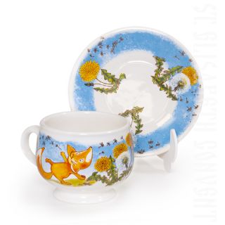 children's cup and a saucer with a fox