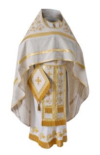 white linen priest vestment with lilies embroidery