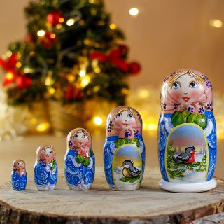 nesting dolls with winter birds