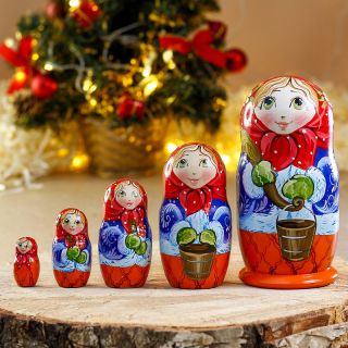 winter nesting doll in mittens