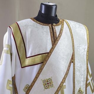 white deacon vestment with embroidered crosses and galloon