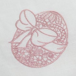 Easter napkin with an embroidered egg in a bow