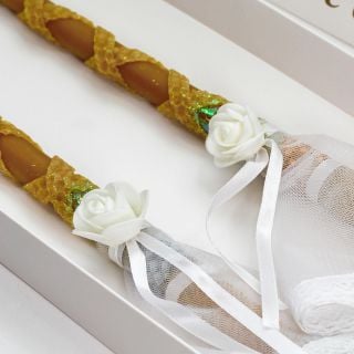 orthodox wedding accessories in a box with candles and towels