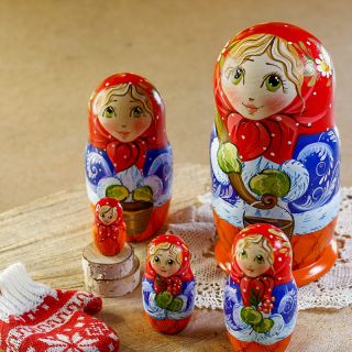 winter nesting doll in mittens