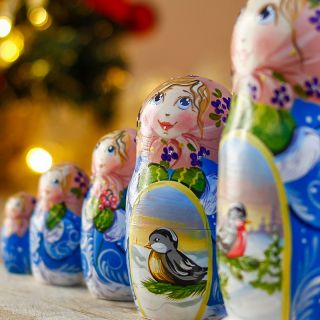 nesting dolls with winter birds