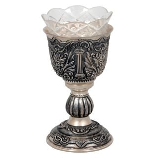 vigil lamp covered with silver and embosses with patterns