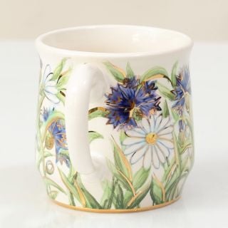 Handmade ceramic mug with cornflowers