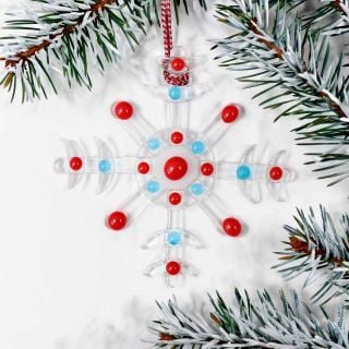 handmade glass snowflake with colourful dots