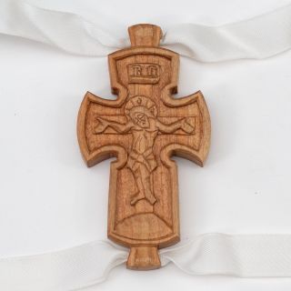 paraman with hand-carved cross