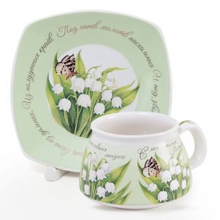 Handmade cup and saucer with lilies-of-tge-valley