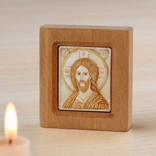 stone icon of Jesus Christ in a wooden frame