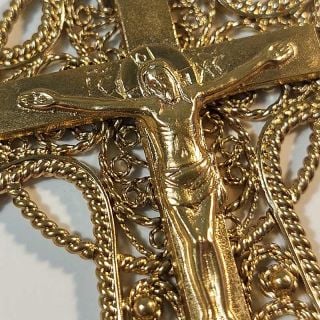 pectoral cross covered with gold and decorated with semi-precious stones