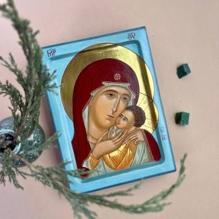 Acrylic icon of the Mother of God with blue background