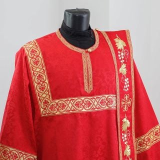 red deacon vestment with embroidered grapes and crosses