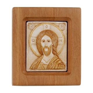 stone icon of Jesus Christ in a wooden frame